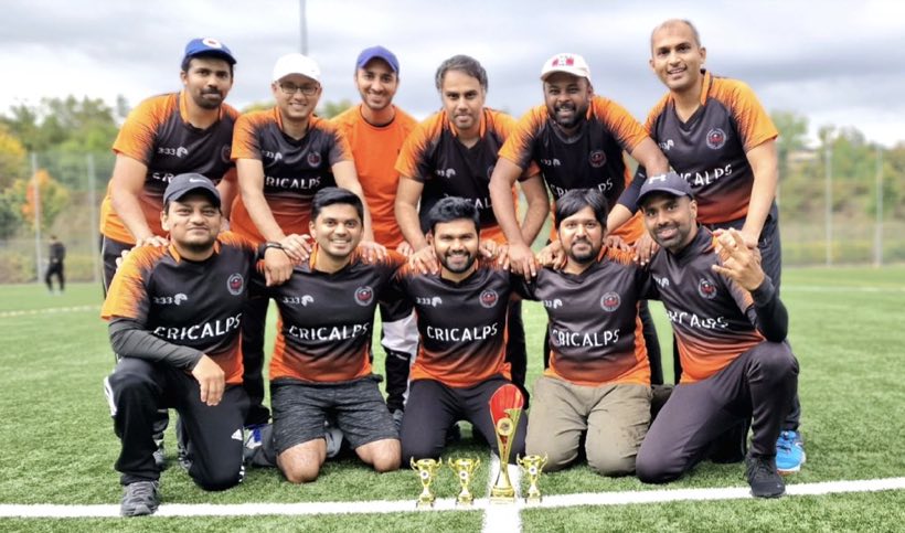 The full orange-kitted squad in a group photograph with their trophies