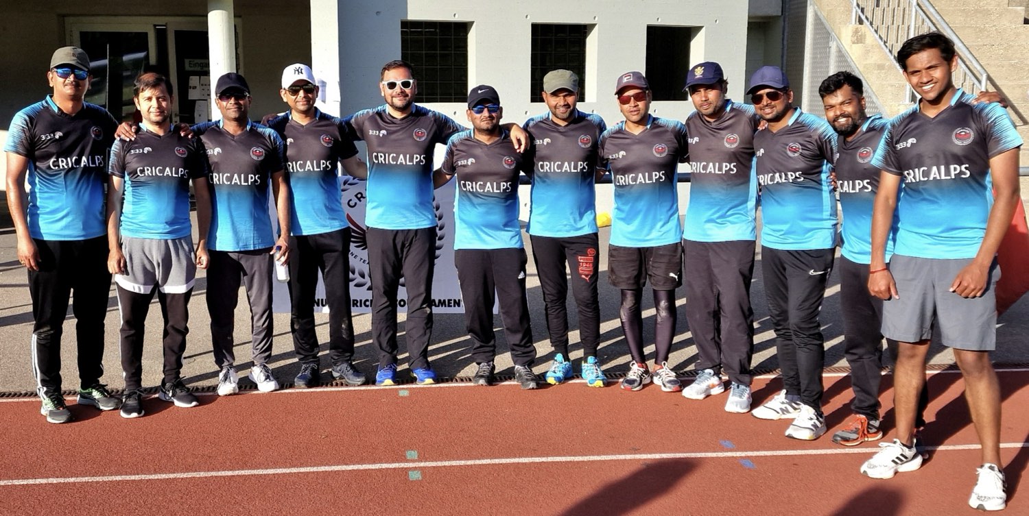 The Cricalps squad lined up in club shirts before a match